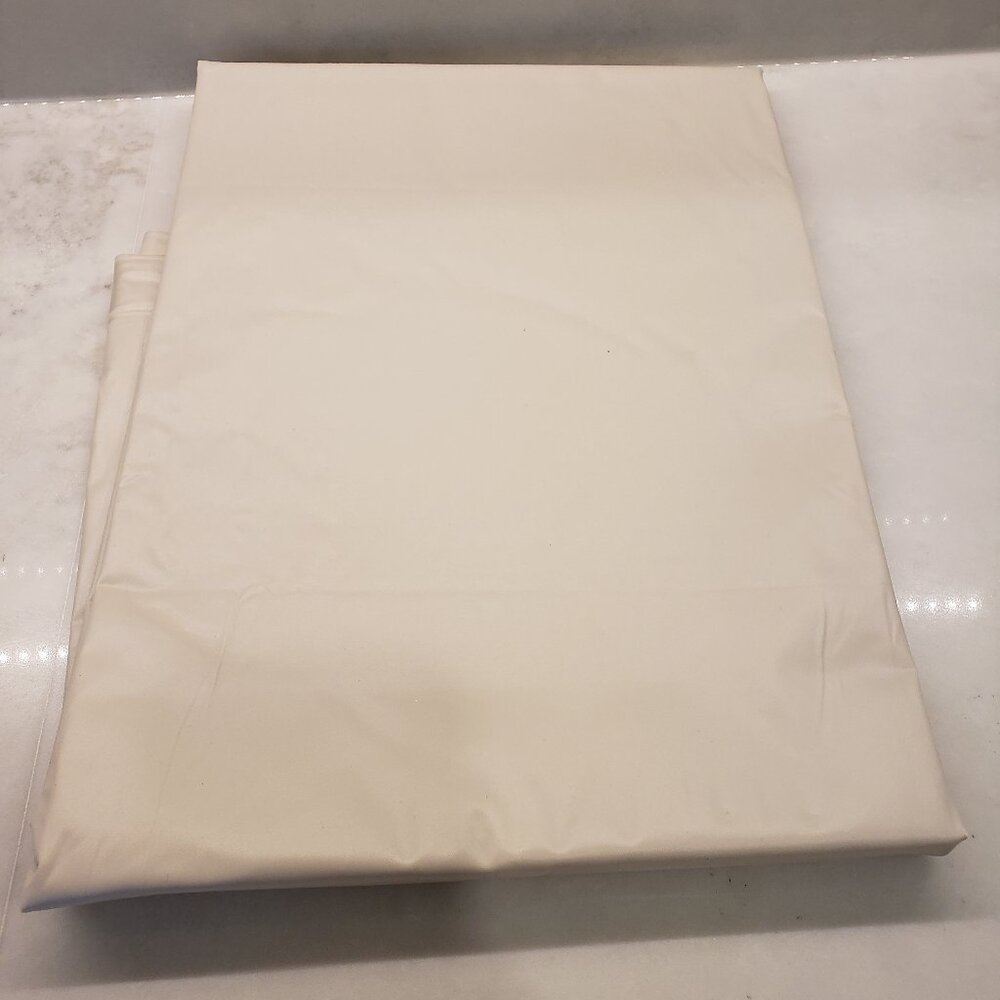 New tan/beige plastic shower curtain